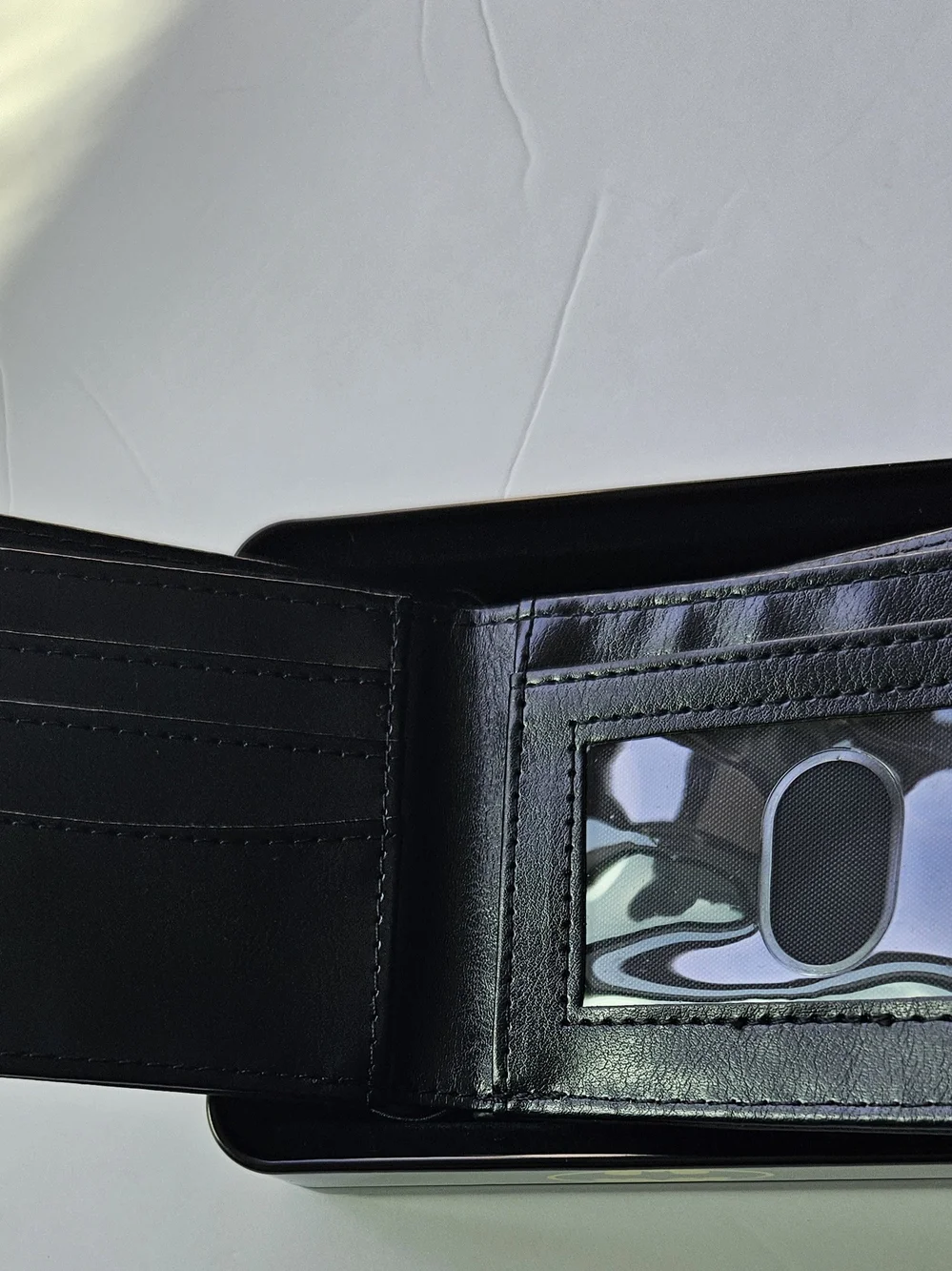 officially licensed DC Comics Batman Bifold Wallet resting inside its protective
